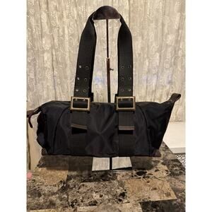 Un Apres Midi De Chien Handbag